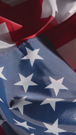 Vertical-Video-Studio-Still-Life-Shot-Of-American-Flag-From-Soccer-World-Cup-Group-Stage-Teams-2022-